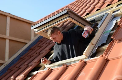 Pose de fenêtres de toit Velux à Feux